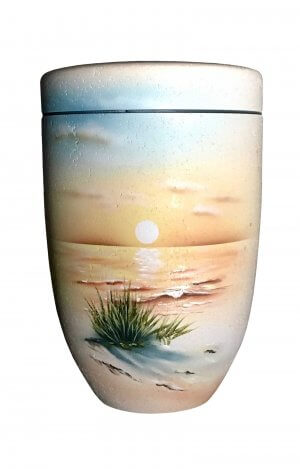 Biodegradable Urn out of shell limestone with sunset