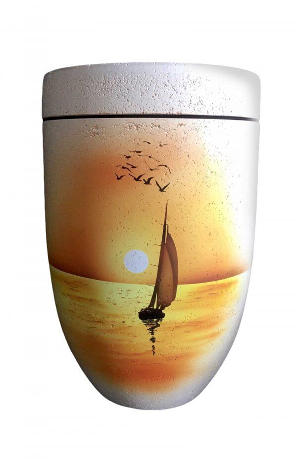 Biodegradable Urn Out Of Shell Limestone With Sailing Boat In Sunset